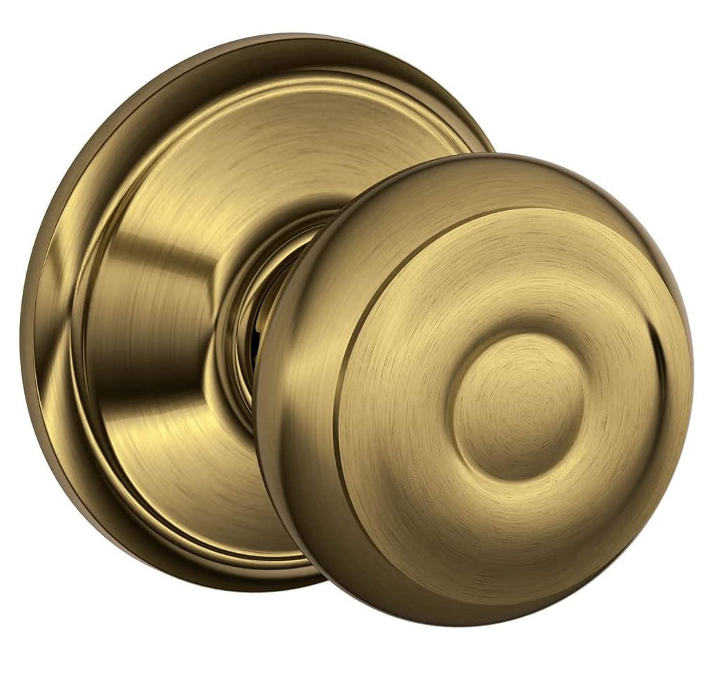 Schlage F10GEO609 Georgian Passage Knob, Antique Brass